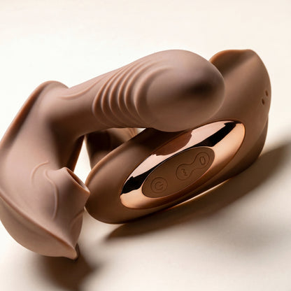 Bronze and brown clitoral suction vibrators with control panel on a light background