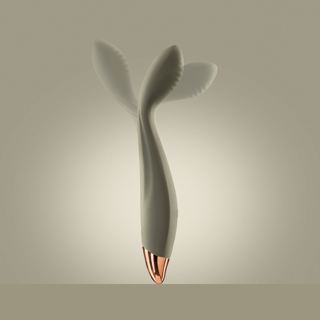 Green G-spot vibrator standing upright with visible motion in head, green background

