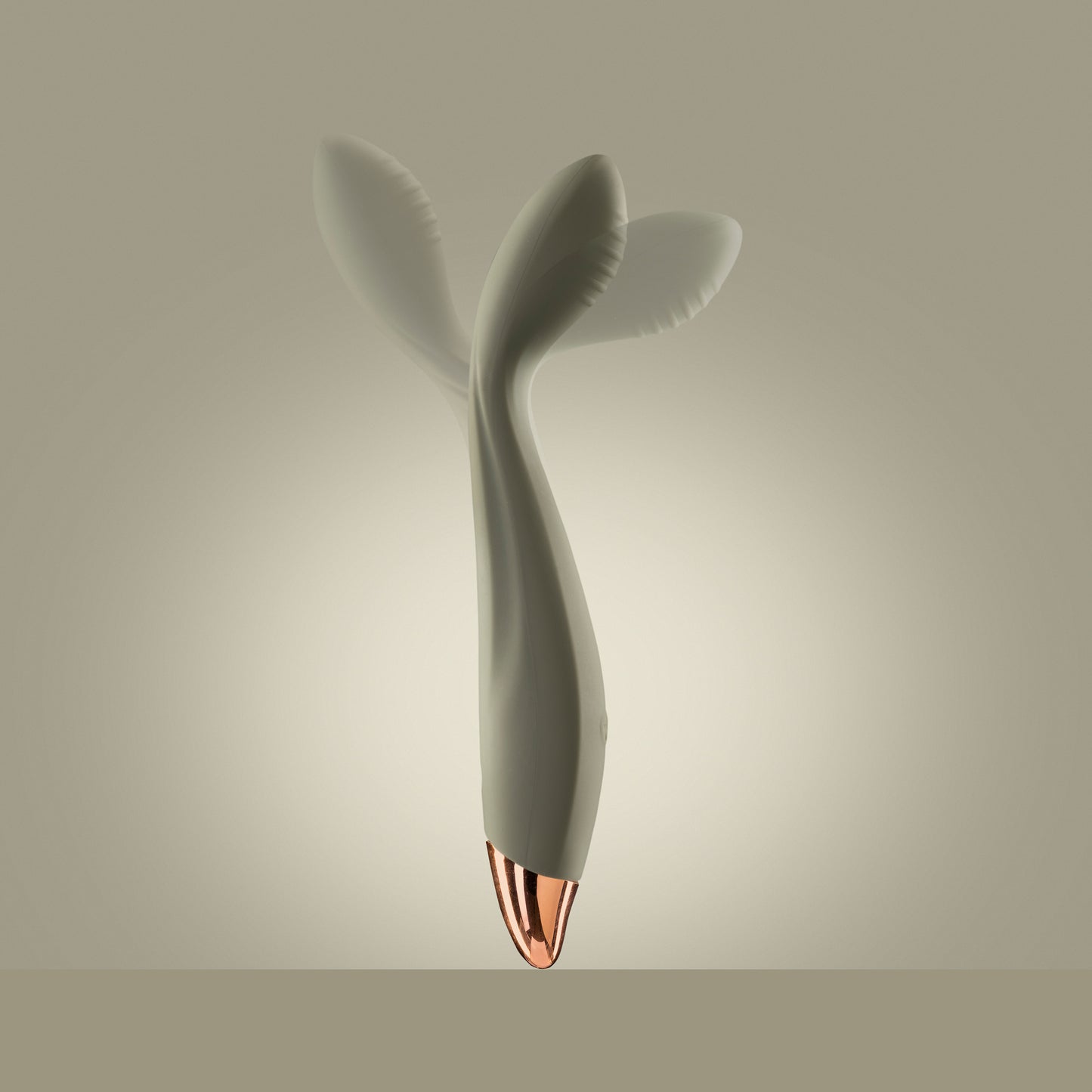 Green G-spot vibrator standing upright with visible motion in head, green background

