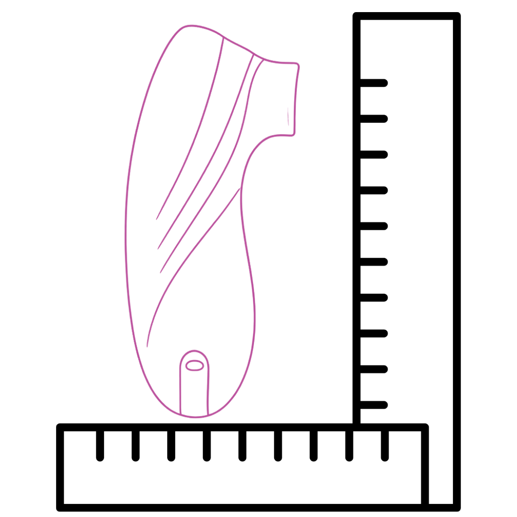 Clitoral suction vibrator with a ruler for scale on a white background