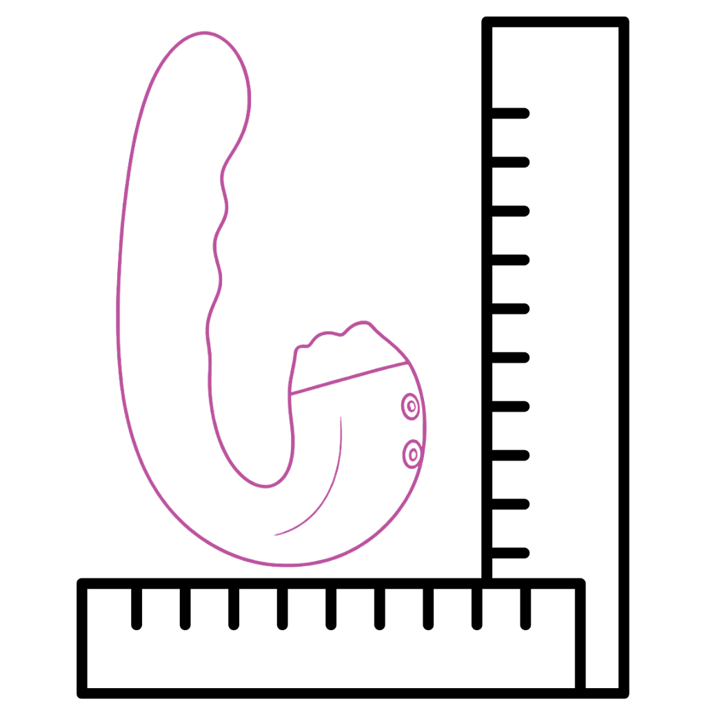 Licking vibrator with a ruler for scale on a white background