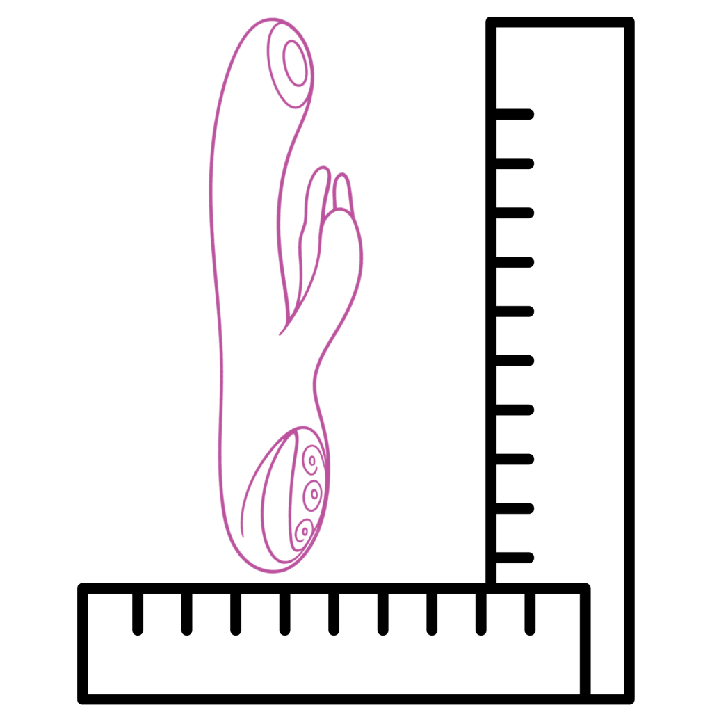 Rabbit vibrator with a ruler for scale on a white background