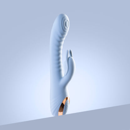 Blue rabbit vibrator standing upright against a blue background

