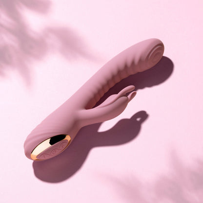 Pink rabbit vibrator on a pink background
