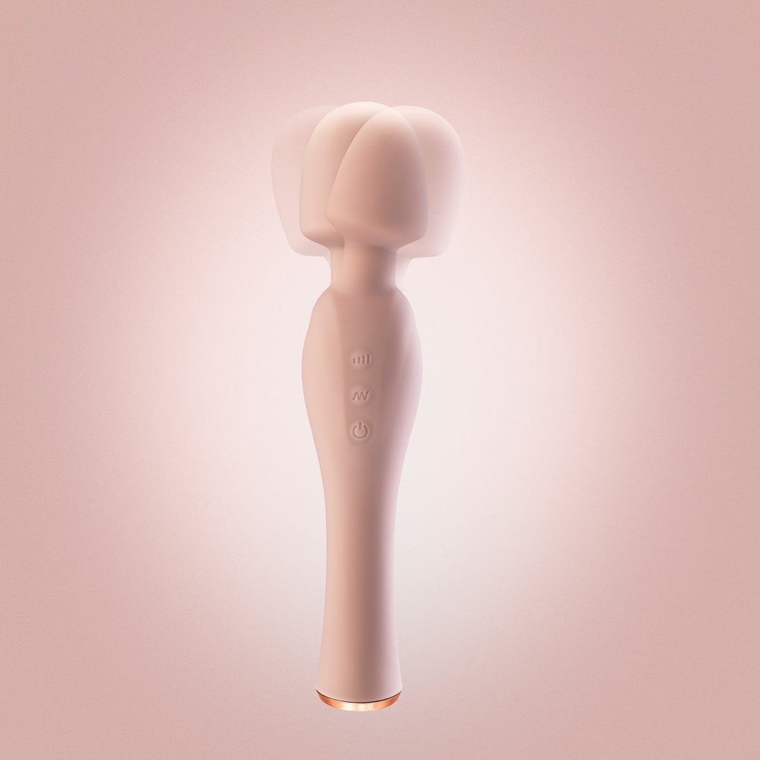 Pink wand vibrator standing upright with motion in head, pink background