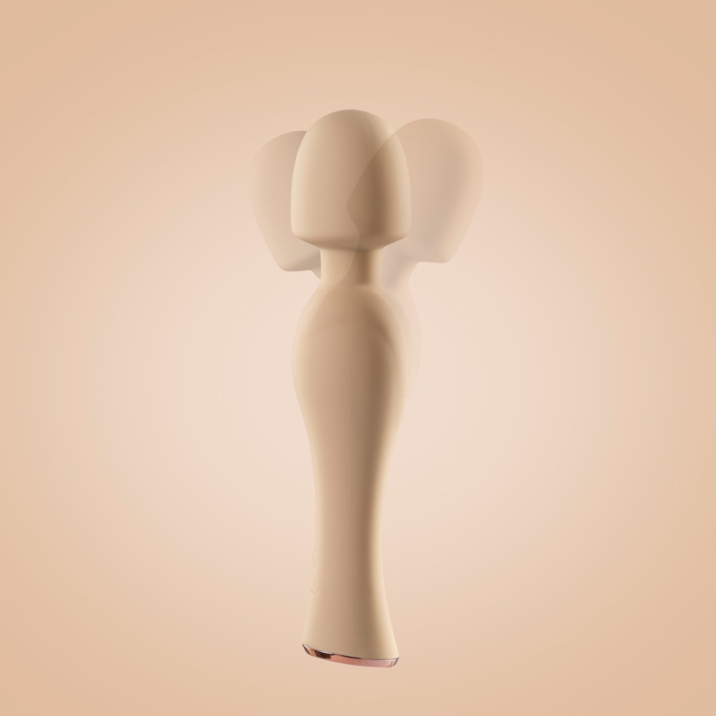 Yellow wand vibrator standing upright with motion in head, off-white background